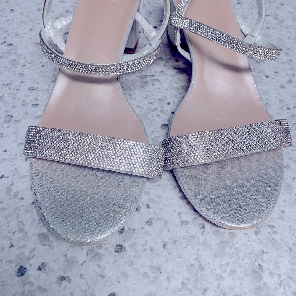 Worn one time for three hours at my sons wedding.  Like new. No buckle- slip on